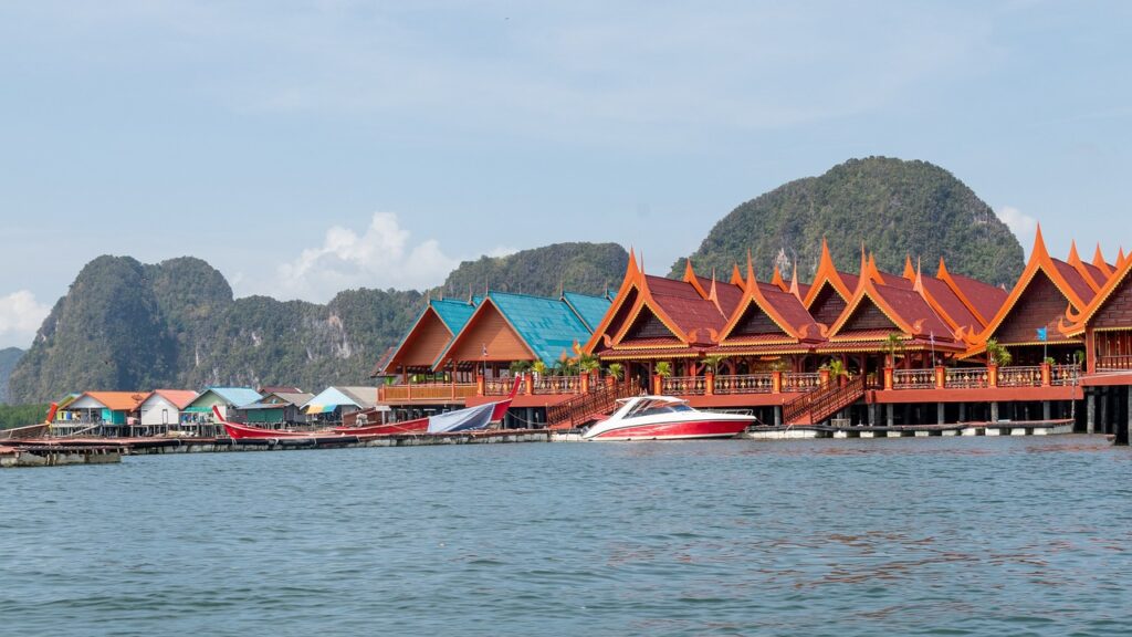 Foreigners exploring property options in Koh Samui with a real estate agent.